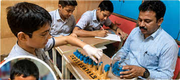 Students learning at the activity table